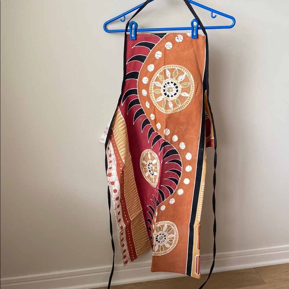Vibrant Orange and Red Tie-Dye Accents with Spiral Patterns